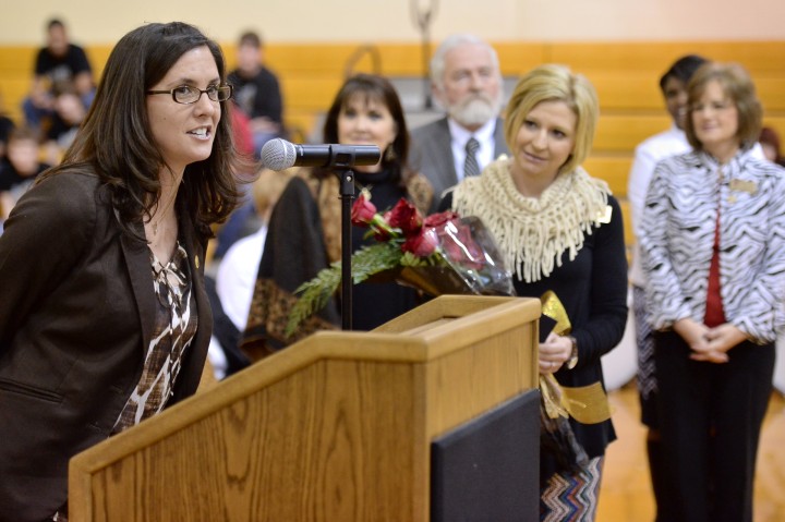 Erin Hodges congratulated by Educators