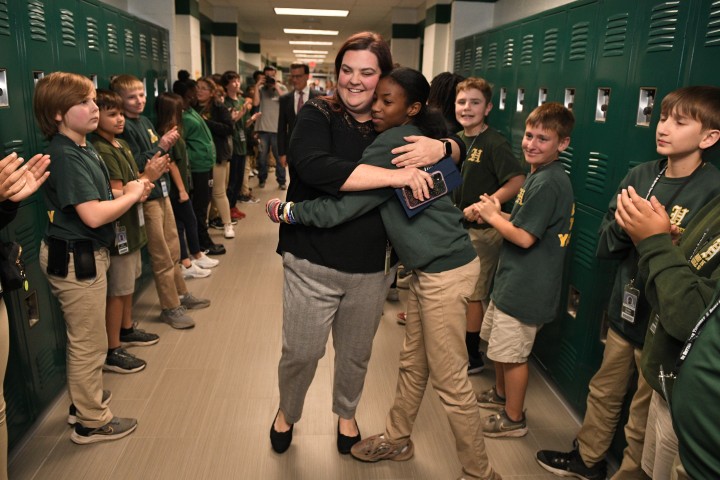 Lauren Waguespack Student Hug