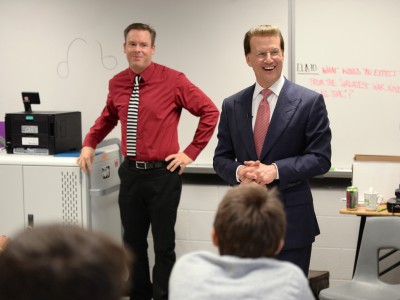 Lowell Milken with students in classroom