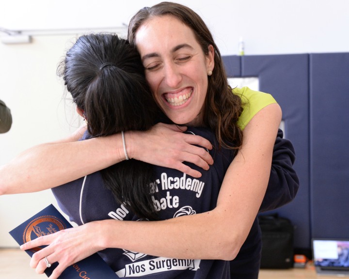 North Star Academy student hugs Allison Cuttler