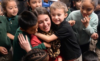 Amanda Raupe with students 1000w