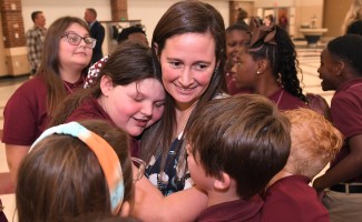 CIS ashley davis student hug