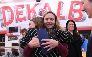DHS student hug