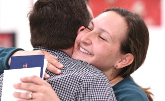 Emily Caldarelli hugs colleague 1000w