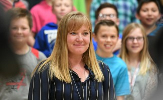 Felicia Casto portrait with students 1000w