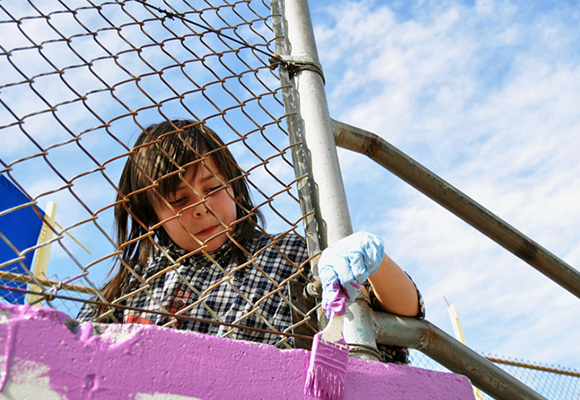 A student at Brown finds the right color and angle for this hard to reach spot.