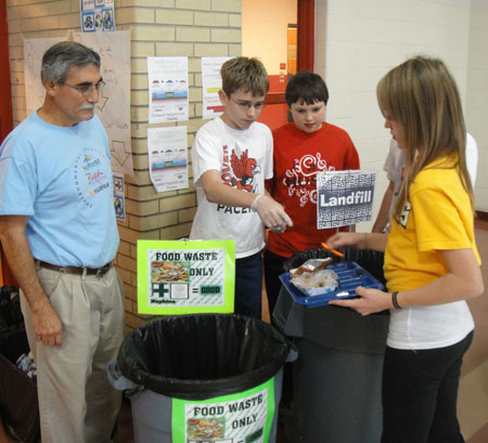 Dr. Hector Ibarra (IA '93) and his students work on another science project. This one is on food waste diversion.