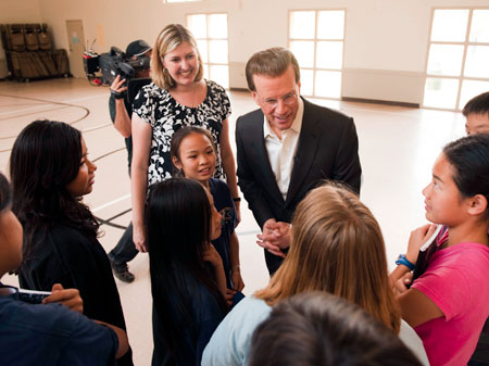 Milken Family Foundation Chairman and Co-Founder Lowell Milken greets students as they prepare to perform a play they wrote and researched based on the life of young civil rights activist Ralph Lazo.