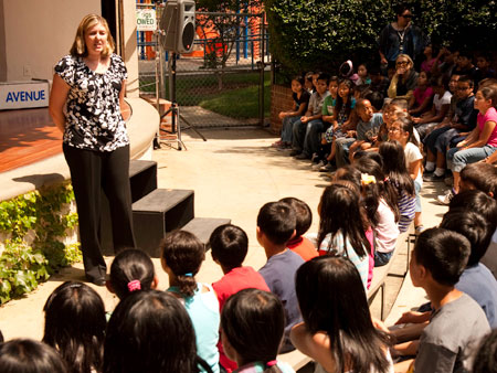 Milken Educator Shannon Garrison (CA ’08) welcomes students at Solano Avenue Elementary School to her class’s production of ‘Ralph Lazo: An Unsung Hero in History,’ a play they researched and wrote using project-based learning.