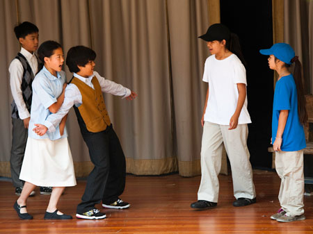 Shannon Garrison’s (CA ’08) students perform ‘Ralph Lazo: An Unsung Hero in History.’ In this scene, Ralph defends his friends from bullies.