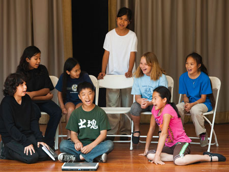Shannon Garrison’s (CA ’08) students talk about Ralph Lazo at the beginning of their play ‘Ralph Lazo: An Unsung Hero in History,’ a performance they researched using project-based-learning techniques.
