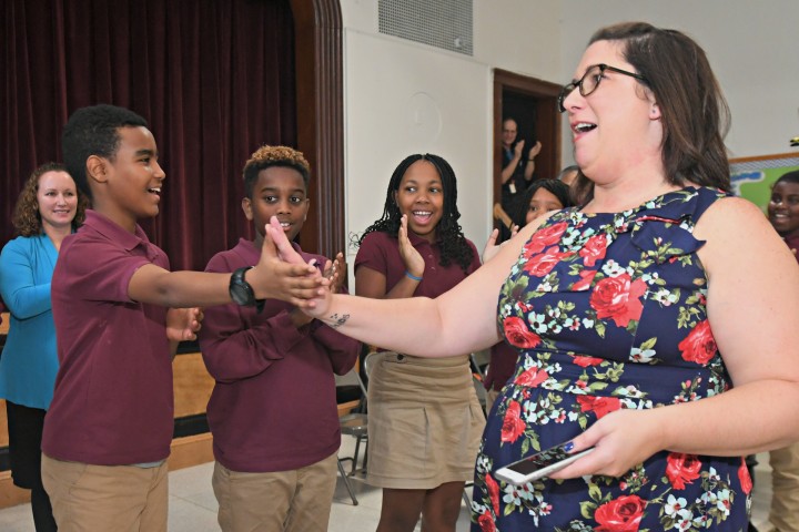 2018 Cambridge Jennifer Gordon student high five