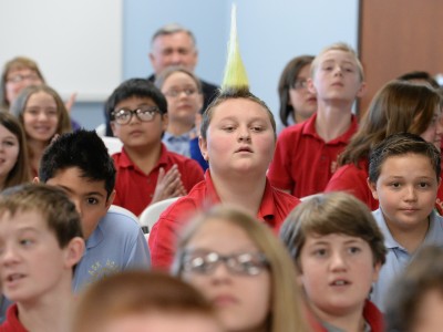 ASK Academy students watch
