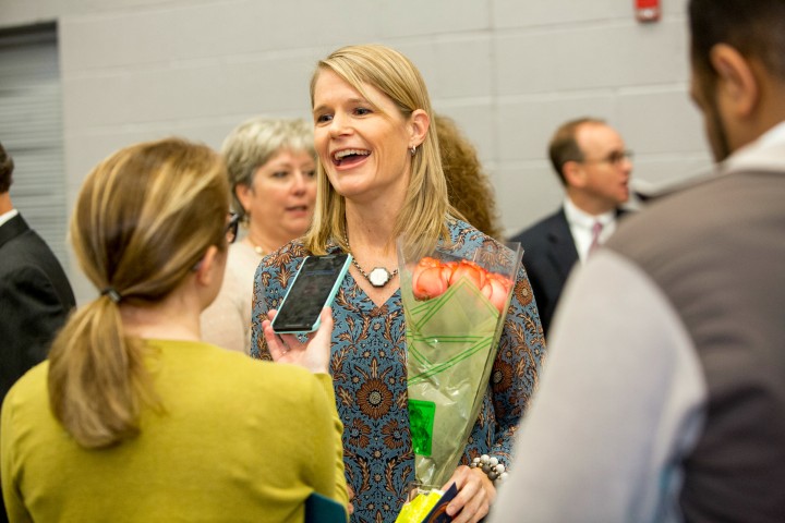 Allison Ruhl talks with reporters