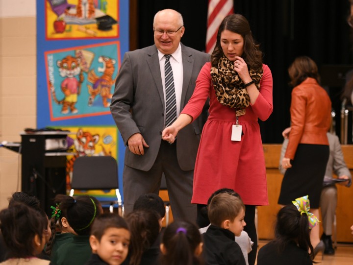 Amanda Raupe seats students before assembly