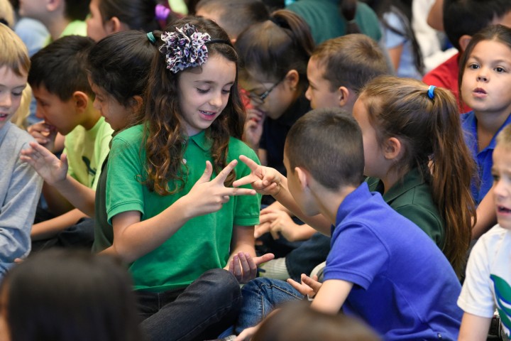 Amy Biehl students rock paper scissors