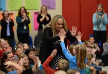 Amy Sanislowski gets high fives