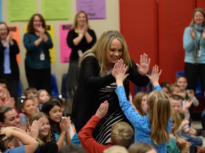 Amy Sanislowski gets high fives