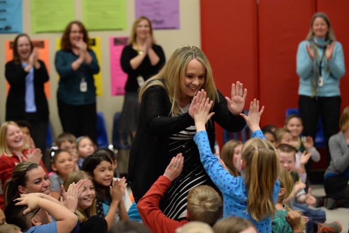 Amy Sanislowski gets high fives