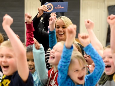 Amy Stanislowski and students cheer