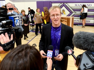 Andrew Cook talks to media