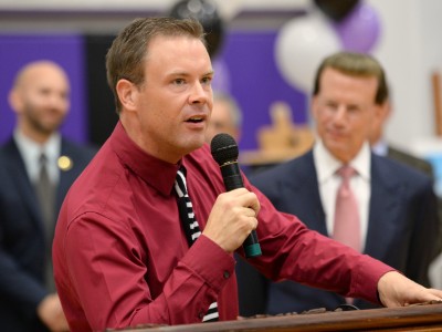 Bill Smithyman addressing assembly