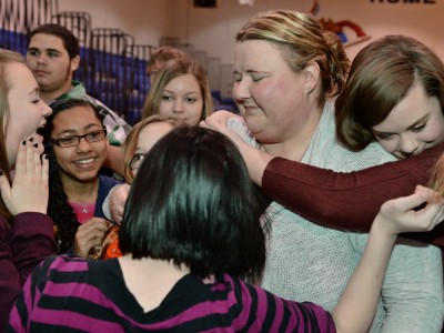 Bode Middle hug from students