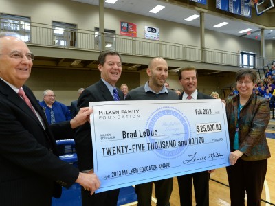 Brad LeDuc Lowell Milken and VIPs with check