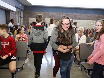 Brown Megan Morgan hugs daughter