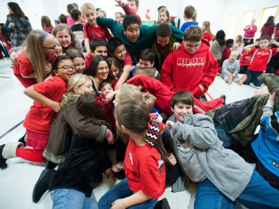 Cagney Weaver swarmed by students