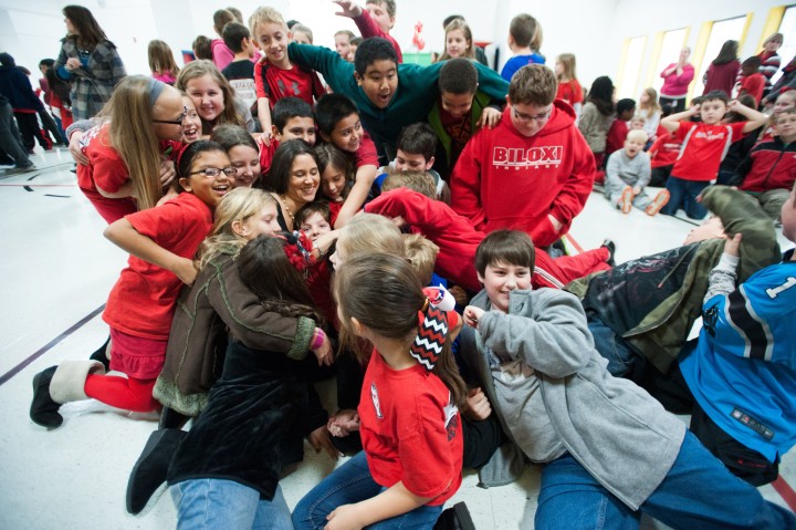 Cagney Weaver swarmed by students