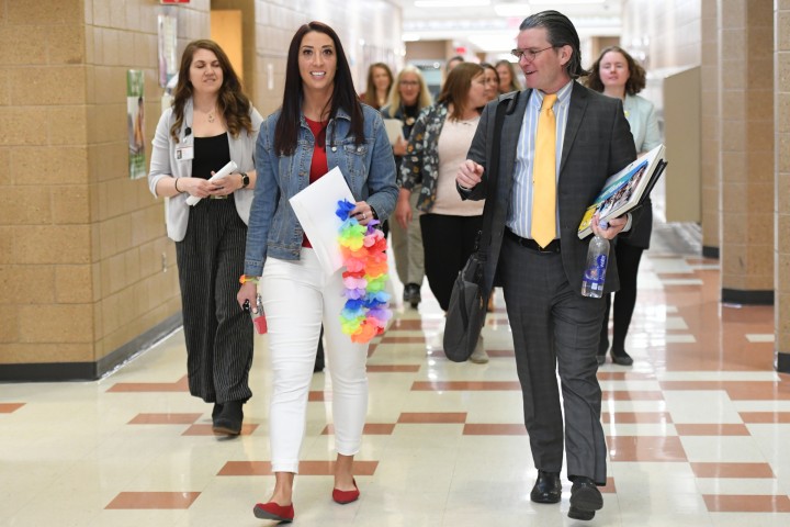 Camelot Camrin Vaux walks to classroom