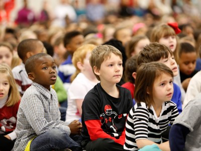 Carman McBride students in packed assembly