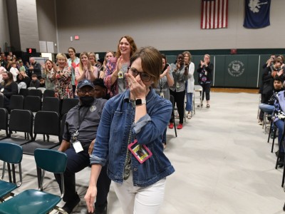 DFMS Lesley Snyder walks to front