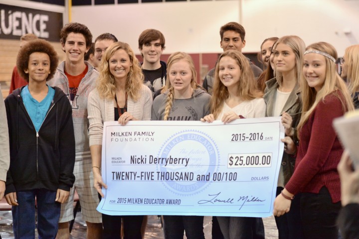 Derryberry and students with check