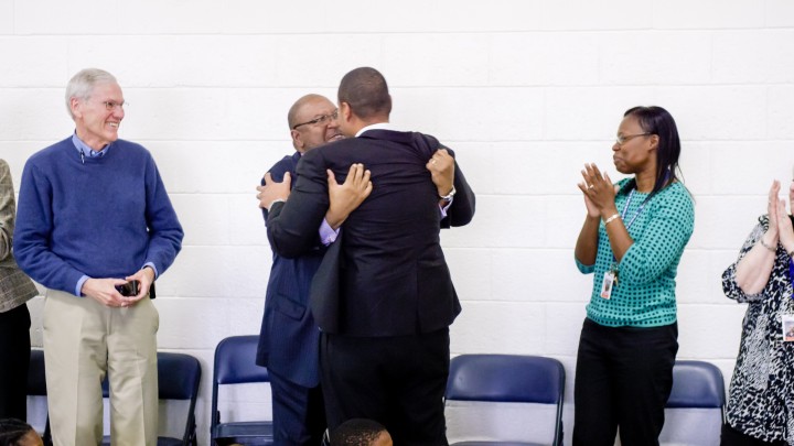 Desi Nesmith hugs mentor Leon McKinley