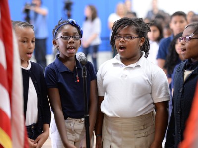 Desi Nesmith students sing national anthem