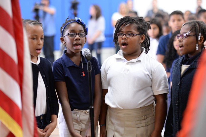 Desi Nesmith students sing national anthem