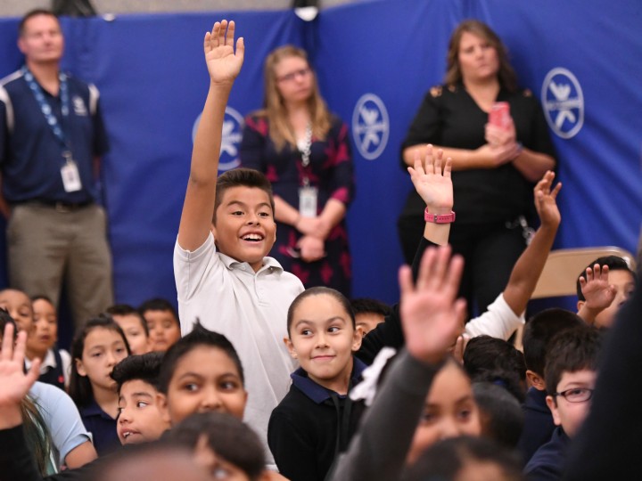 Elkhart students hands up 1