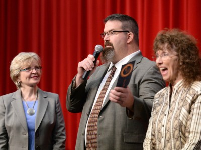 Eric Patin accepts Milken Award