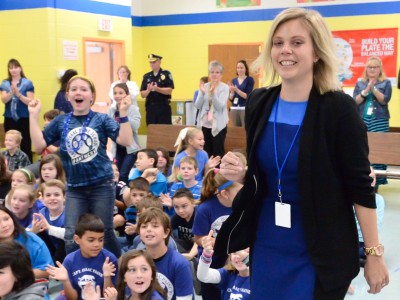 Erin Quinlan cheered by students