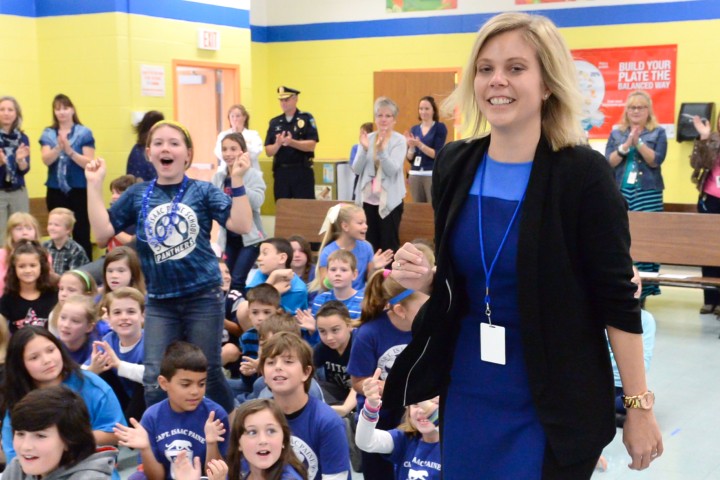 Erin Quinlan cheered by students