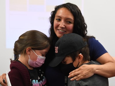 Gonzales Gabrielle Kahawai hugs students