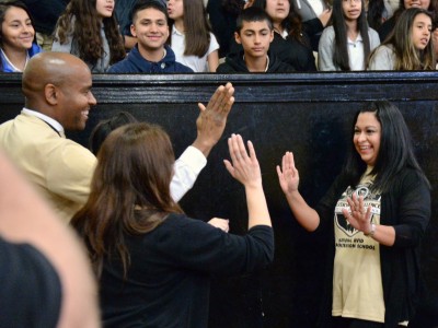 High fives from colleagues