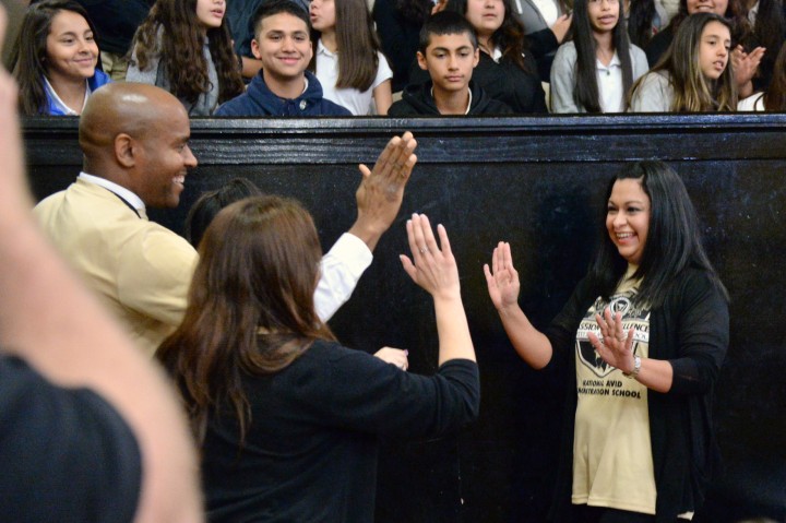 High fives from colleagues