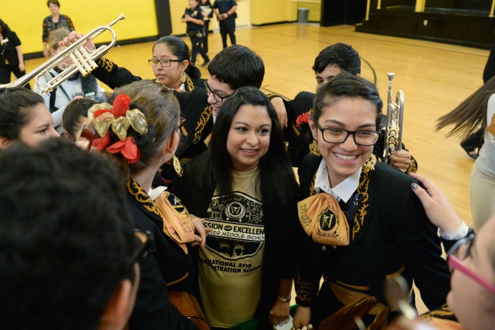 Hug from mariachi band