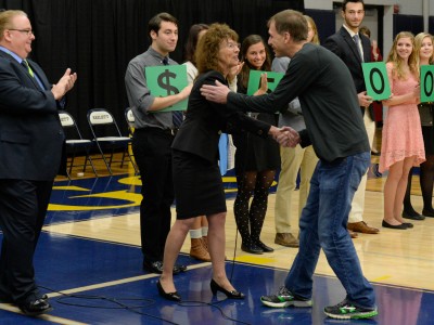 Jane Foley congratulates recipient