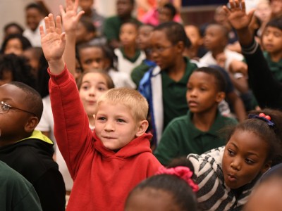 Jeanerette students hands up