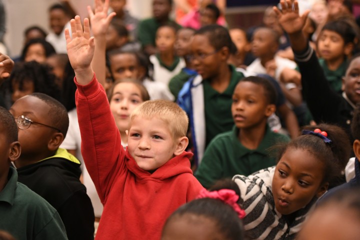 Jeanerette students hands up