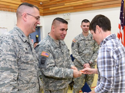 Jenna White with military personnel